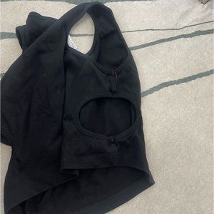 black Adika crop top with cut outs on side